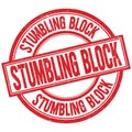 STUMBLING BLOCK written word on red stamp sign Royalty Free Stock Photo