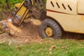 A stump is shredded with removal, grinding in the stumps and roots into small chips Royalty Free Stock Photo