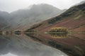 Stuning Autumn Fall landscape image of Lake Buttermere in Lake D