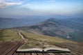 Stuning sunset landscape image of The Great Ridge in the Peak District in England  in pages of open book, story telling concept Royalty Free Stock Photo