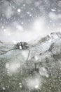 Stuning Winter landscape image of Chrome Hill and Parkhouse Hill in Peak District England in heavy snow storm