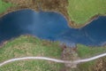 Stunning aerial drone landscape image over River Brathay near Elterwater in Lake District with Langdale Pikes in distance