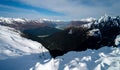 Stunning aerial image of the mouth of the glacier at Lake Wanaka surrounded by snow capped mountains taken on a sunny winter day, Royalty Free Stock Photo