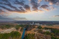 A stunning aerial shot of the Catawba River surrounded by vast miles of green and autumn colored trees with powerful clouds Royalty Free Stock Photo