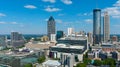 A stunning aerial shot of the city skyline with skyscrapers in downtown Atlanta Georgia with blue sky