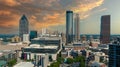 A stunning aerial shot of the city skyline with skyscrapers and office buildings and lush green trees in downtown Atlanta Georgia Royalty Free Stock Photo