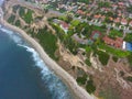 Stunning aerial shot of the deep blue ocean water and the coastline at at Bluff Cove beach Royalty Free Stock Photo