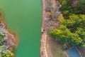 A stunning aerial shot of the silky green Catawba River surrounded by vast miles of green and autumn colored trees in Charlotte Royalty Free Stock Photo