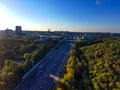 A stunning aerial shot of vast miles of lush green trees, the freeway, the Chattahoochee river and blue sky at sunset Royalty Free Stock Photo