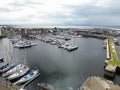 Stunning aerial view of Ardrossan marina, showing a vast array of colorful boats in Scotland