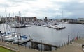 Stunning aerial view of Ardrossan marina, showing a vast array of colorful boats in Scotland
