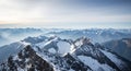 Alpine peaks blanketed in snow meet the clear sky Royalty Free Stock Photo