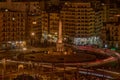 Stunning aerial view of an illuminated cityscape at night, illuminated by a myriad of lights