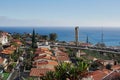 Stunning aerial view of the picturesque city of Madeira, Spain, featuring a long, arched bridge