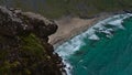 Sand beach Kvalvika with turquoise colored water and wild surf located on the coast of MoskenesÃÂ¸ya island, Lofoten.