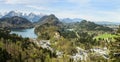 Stunning alpine landscape with glacier lakes,high mountains and Hohenschwangau castle near famous Neuschwanstein Royalty Free Stock Photo