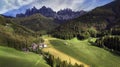 Alpine scenery of breathtaking Dolomites rocks mountains in Italian Alps, South Tyrol, Italy. Aerial view of Val di Funes Royalty Free Stock Photo