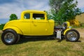 Stunning amazing side view of classic vintage retro street rod car Royalty Free Stock Photo