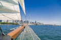 Stunning amazing view of a tall ship nose traveling on the lake toward Toronto downtown