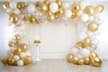 A stunning arrangement of white and gold balloons creating a beautiful balloon arch, Glam New Years Eve celebration white and gold