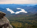 Beautiful fall colors and sky over the Adirondack Mountains with Lake Placid and West Lake in the background in New York state Royalty Free Stock Photo