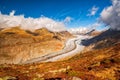 Stunning autumn scenery of tongue of Aletsch Glacier in Swiss Alps. UNESCO World Heritage Site