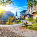 Stunning autumn view of Lauterbrunnen village with awesome waterfall Staubbach and Swiss Alps in the background