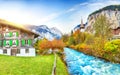 Stunning autumn view of Lauterbrunnen village with awesome waterfall  Staubbach  and Swiss Alps in the background Royalty Free Stock Photo