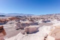 Stunning barren area in a white desert with volcanic rock formations in Campo De Piedra Pomez