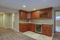 Stunning basement interior with wet bar