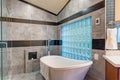 Stunning bathroom with a freestanding tub.