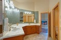 Stunning bathroom with a double vanity with marble top.