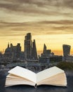 Stunning beautiful landscape cityscape skyline image of London in England during colorful Autumn sunrise coming out of pages of Royalty Free Stock Photo