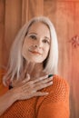 Stunning beautiful and self confident best aged woman with grey hair smiling into camera Royalty Free Stock Photo