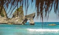 Stunning beautiful tropical island paradise landscape shot under beach straw umbrella panorama view of rocks on an amazing turquoi