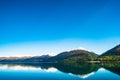 Stunning beautiful view beside lake Wanaka with alps mountain. Noon scenery with blue sky. I Royalty Free Stock Photo