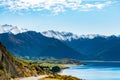 Stunning beautiful view of the road beside Lake Wanaka with alps mountain. Noon scenery with some cloudy and blue sky. nature Royalty Free Stock Photo