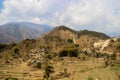 The highest pedestrian pass in the world of Thorong La. The start of trekking around Annapurna - rice fields, green plants, low mo Royalty Free Stock Photo