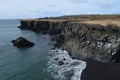 Stunning Black Sand Beach with Waves Rolling Ashore in Iceland Royalty Free Stock Photo