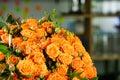 Stunning Bouquet of Orange Roses on Table Royalty Free Stock Photo