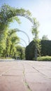 Stunning brick archway situated in a grand courtyard