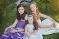 Stunning Brunette blond chestnut blue eyes sisters girls wearing stylish white purple dress enjoying life time together summer sun