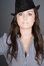 Stunning Brunette Teenager with Black Hat Royalty Free Stock Photo