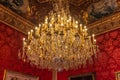 Stunning chandelier in the apartments of Napoleon III in Louvre Museum with luxury baroque furnishings