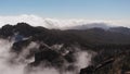 Stunning cinematic view from a height - a drone flying over a valley on the island of Gran Canaria: pine forest