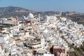 Stunning cityscape of densely populated Fira, the main town of Santorini island in Greece