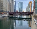 Stunning cityscape reflections on Chicago River during snowy morning Royalty Free Stock Photo