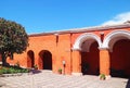 Stunning Cloister with Orange Red Colored Stone Archway of the Convent of Santa Catalina de Siena in Arequipa, Peru