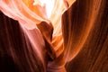 Stunning close-up of a canyon with a slice of warm sunlight streaming through the rocky walls