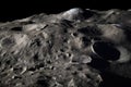 stunning close-up of the moon's craggy surface, with lunar dust and rocks visible